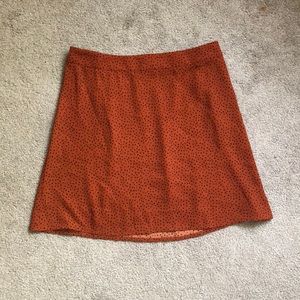 Burnt Orange & black polka dot mini skirt